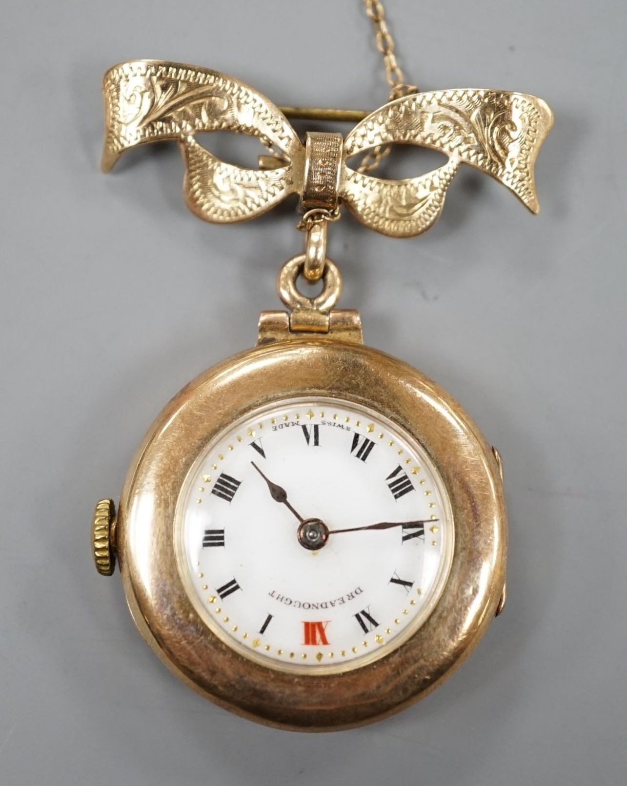 A lady's 9ct 'Dreadnought' fob watch, on a 9ct gold suspension brooch, gross weight 18.5 grams.